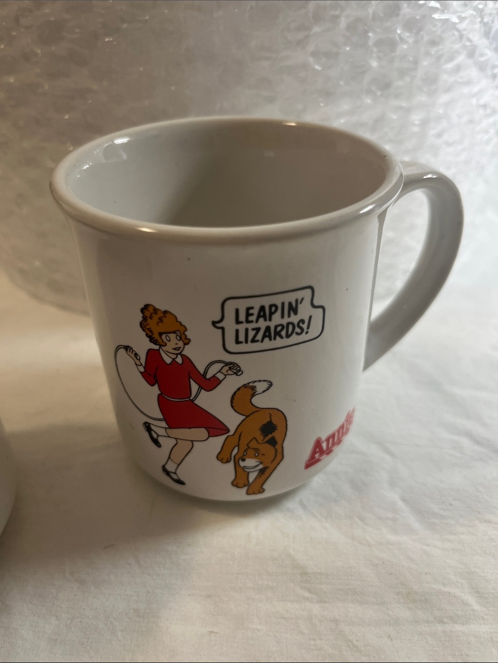 Set of four Orphan Annie White Ceramic Cups— Leapin' Lizards! Design